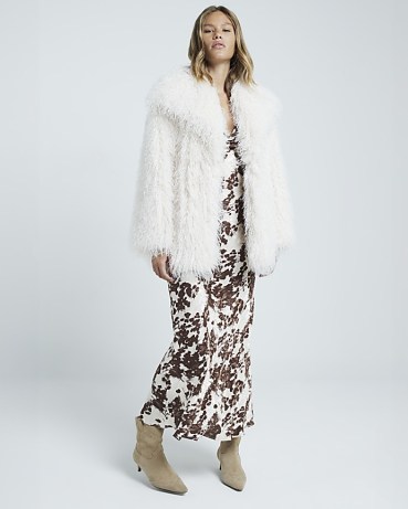 River Island Cream faux fur oversized jacket | women’s shaggy jackets | womens fluffy winter outerwear