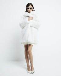 RIVER ISLAND Cream mid length faux fur coat / women’s fluffy winter coats / glamorous fashion