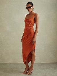 Reiss Carla Jersey Ruched Midi Dress in Rust – sleeveless cut out asymmetric hemline dresses