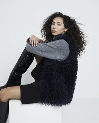 River Island Navy Shaggy faux fur longline Gilet | fluffy gilets | sleeveless dark blue textured winter jacket