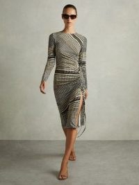 REISS Riyo Printed Ruched Midi Dress in Black/Olive – chic fitted evening occasion dresses