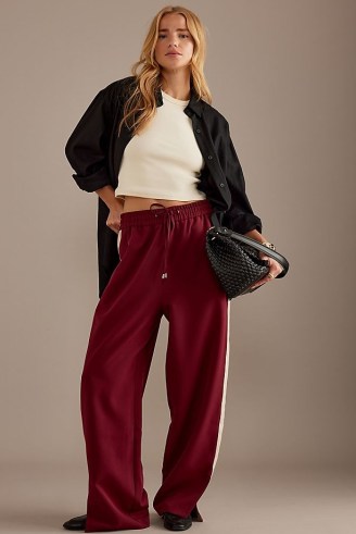 Anthropologie Side Stripe Track Pants in Burgundy / women’s dark red drawstring waist jogger / womens drawcord slit hem joggers