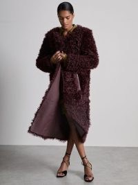 Reiss Dianna Atelier Shearling Convertible Coat in Burgundy | glamorous dark red textured winter coats