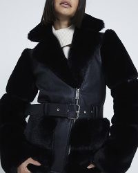 RIVER ISLAND Black Belted Faux Fur Biker Jacket ~ women’s fashionable winter jackets ~ on-trend outerwear