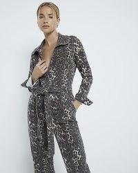 River Island Brown Leopard Print Denim Jumpsuit | women’s front zip up tie waist jumpsuits with animal prints