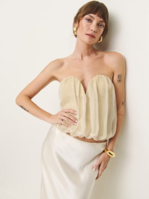 Reformation Sylvana Top in Buttercream – fitted cream sheer overlay tops – sweetheart neckline evening fashion – luxe occasion clothing