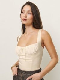 Reformation Odessa Satin Top inIvory – sleeveless fitted ruched bust tops