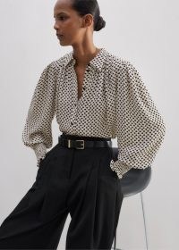 ME and EM Silk Daisy Polka Dot Print Swing Blouse in Light Cream / Black | balloon sleeve floral print blouses | feminine oversized collared top