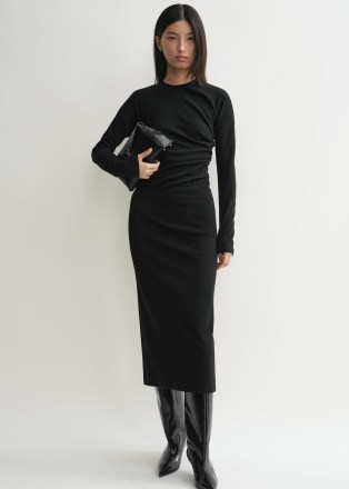 TOTEME Twisted jersey dress in black ~ chic fitted long sleeve twist detail midi dresses ~ asymmetric gathered details