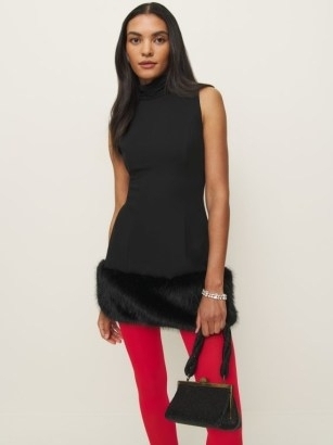 Reformation Aneira Dress in Black – sleeveless LBD with faux fur hemline