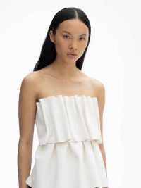 DAGMAR Sculpted tube top in White – strapless ruched tops