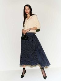 Reformation Gwen Skirt in Button – polka dot print fit and flare midi skirts