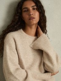 Reiss Birdie Brushed Crew-Neck Jumper With Alpaca Wool in Neutral | womens round neck drop shoulder slit cuff jumpers | women’s luxe soft feel sweater