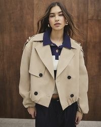 River Island Beige Short Bubble Hem Trench Coat | women’s cropped coats | womens relaxed gathered hemline jacket