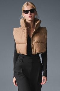 alo yoga Cropped Gold Rush Puffer Vest in Core – women’s padded crop hem gilet